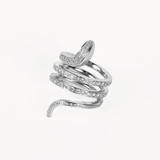 Anello snake in oro bianco 750 con diamanti taglio rotondo